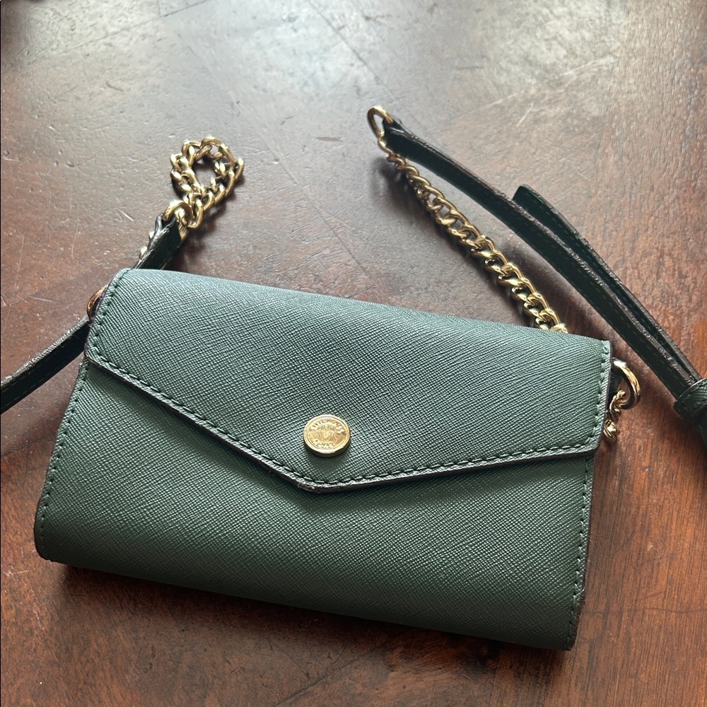Kors green wallet on a chain